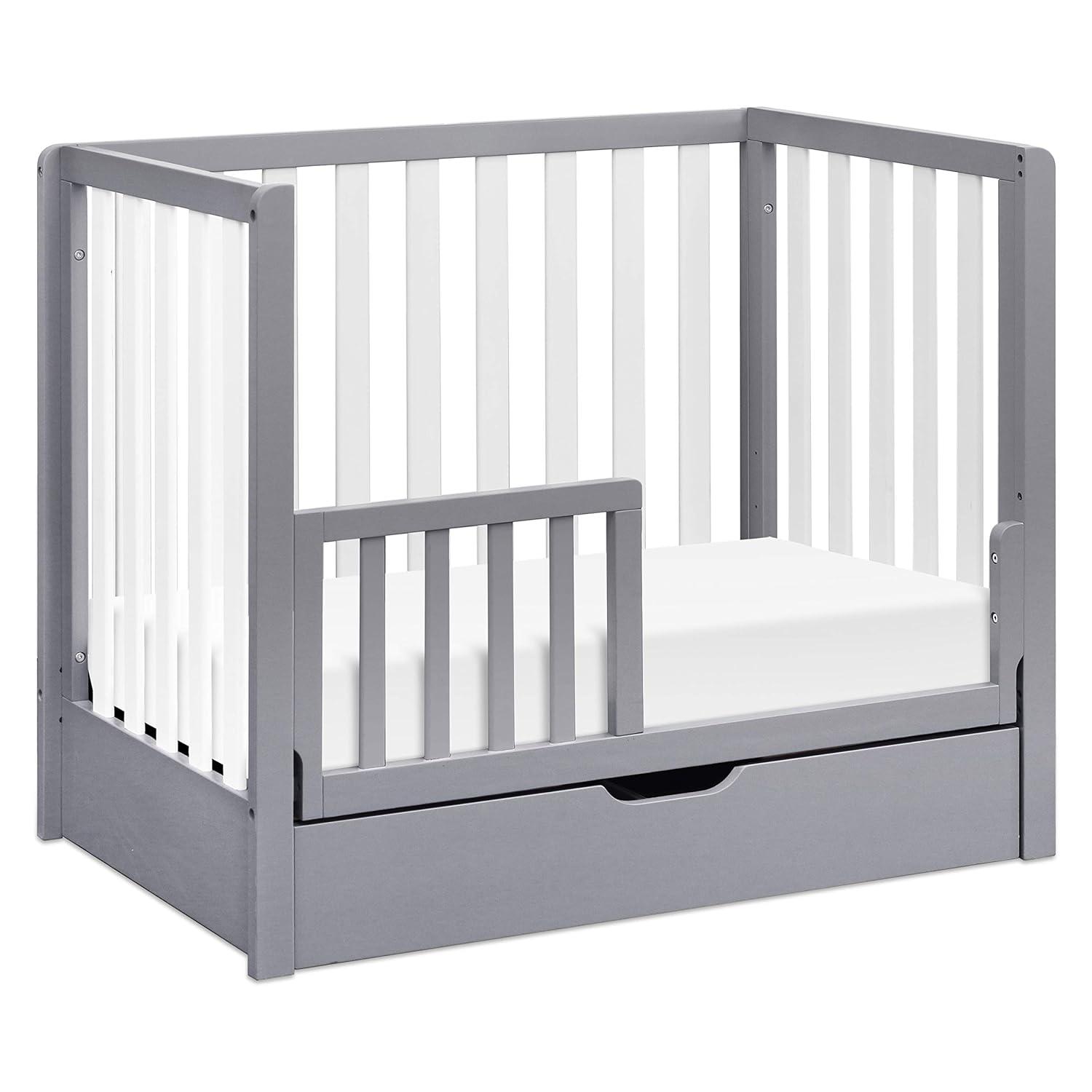 imageCarters by DaVinci Colby 4in1 Convertible Mini Crib with Trundle Drawer in Grey and White Greenguard Gold Certified Undercrib StorageGray and White